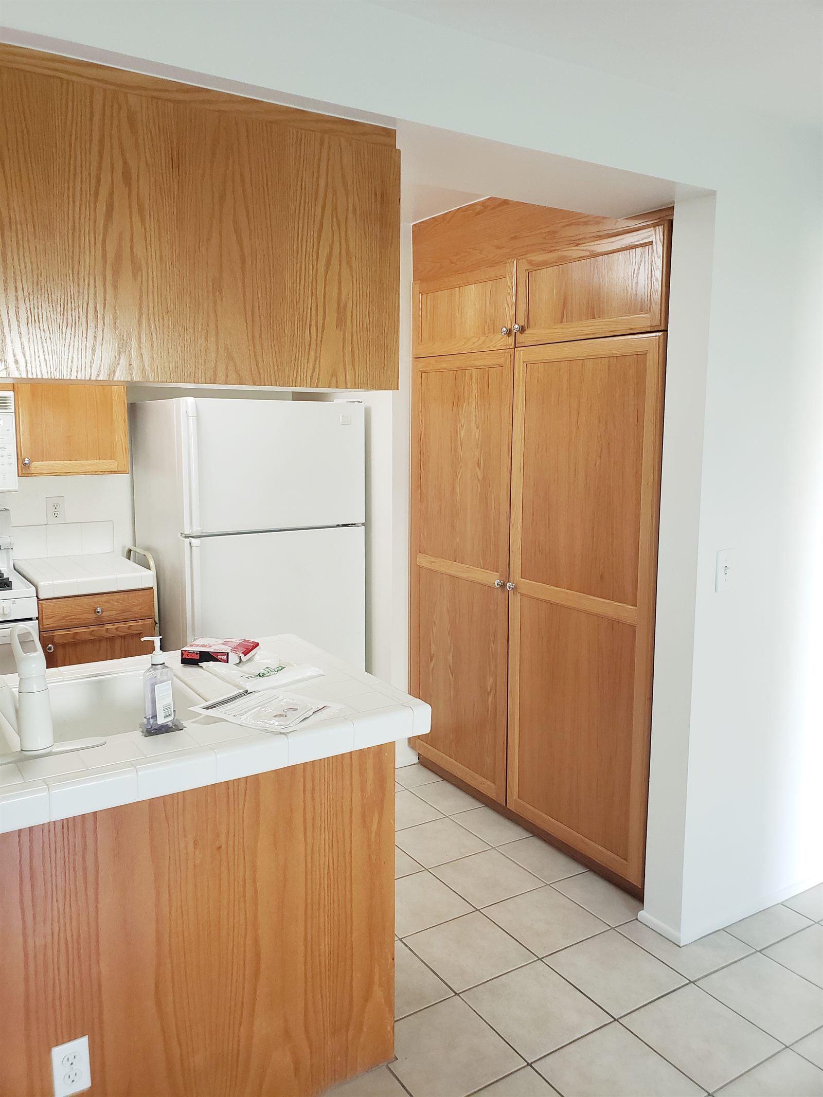 Before: original dated kitchen prior to remodel
